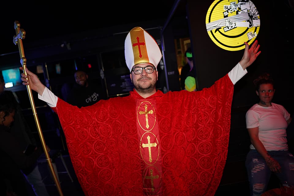 Guest dressed as the pope at the party